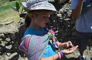 Lucia with prickly-pear fungus called cochinilla- a valuable commodity sold for dyes, lipstick pigment.