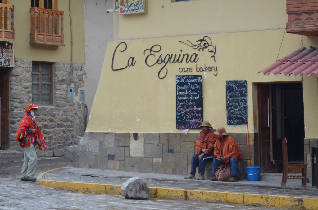 Waiting for work.  Unfortunately they are too poor to eat at the tourist cafe.